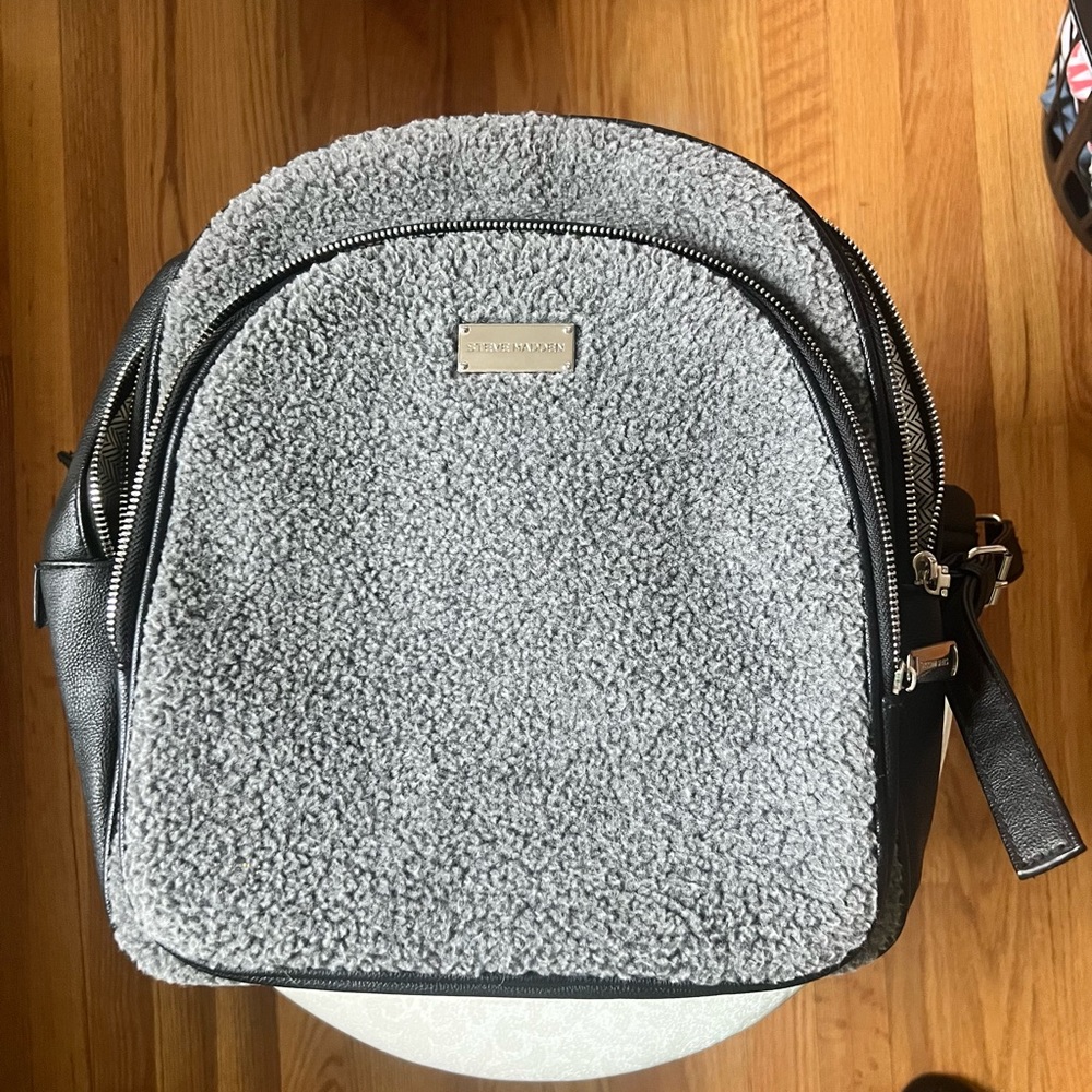 Item: Steve Madden faux leather faux fur backpack